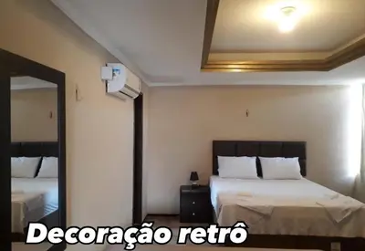 Uma cama ou camas num quarto em Hotel Nacional