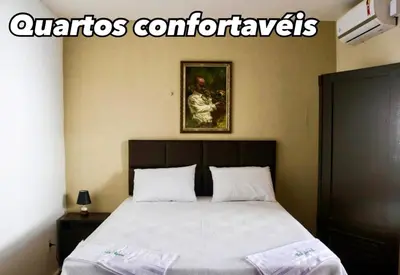 Uma cama ou camas num quarto em Hotel Nacional
