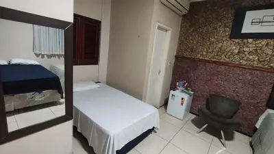 Uma cama ou camas num quarto em Hotel Nacional