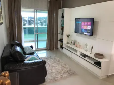 Uma televisão e/ou sistema de entretenimento em Vg Fun - Frente Mar! No melhor da praia do futuro