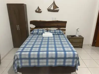 Uma cama ou camas num quarto em Vilas Blancas