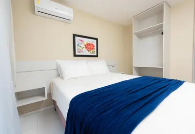Uma cama ou camas num quarto em Dei Fiori Guaramiranga
