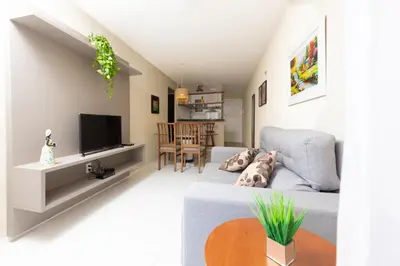 Uma televisão e/ou sistema de entretenimento em Dei Fiori Guaramiranga