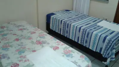 Uma cama ou camas num quarto em Apto próximo ao Centro de Eventos e OAB-CE