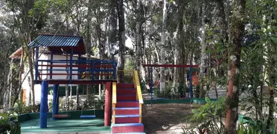 A área de jogos para crianças em Pousada de serra TUTUCA