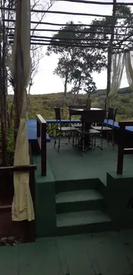 Uma varanda ou terraço em Pousada de serra TUTUCA