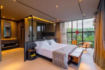 Uma cama ou camas num quarto em Carmel Taíba Exclusive Resort