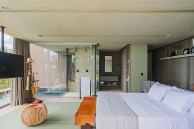 Uma cama ou camas num quarto em Carmel Taíba Exclusive Resort