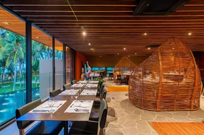 Uma área de estar em Carmel Taíba Exclusive Resort