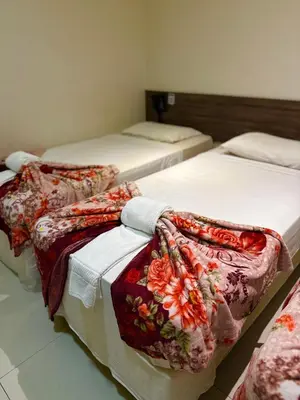 Uma cama ou camas num quarto em Angra Praia Hotel