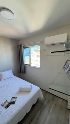 Uma cama ou camas num quarto em Apartamento Praia de Iracema com vista mar