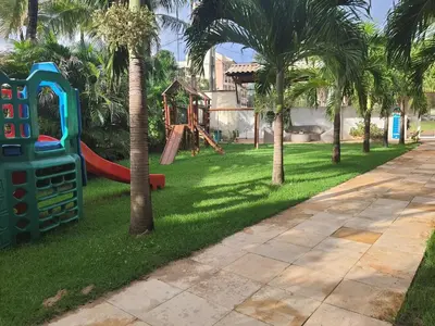 Um jardim no exterior de Pousada Porto das Dunas