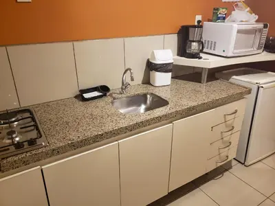 A cozinha ou kitchenette de PRAIA MANSA 1205