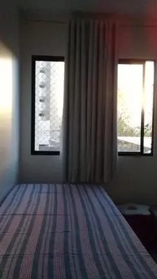 Uma cama ou camas num quarto em Apartamento no Meireles, ótima localização!