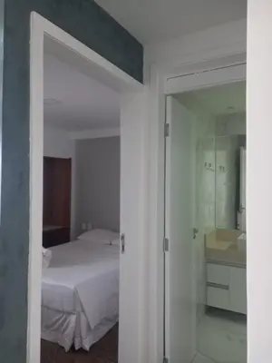 Uma cama ou camas num quarto em Hotel Flat Atlântico