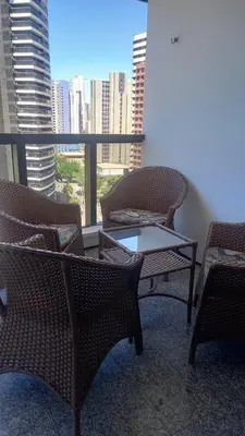 Uma área de estar em Hotel Flat Atlântico