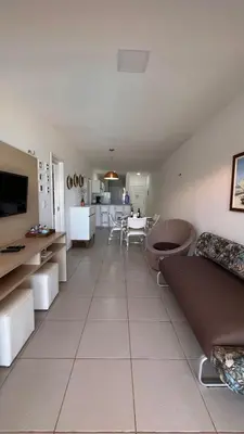 Uma televisão e/ou sistema de entretenimento em Apart Canoa Quebrada