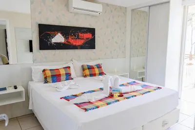 Uma cama ou camas num quarto em Atlantic Palace Apart-Hotel