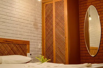 Uma cama ou camas num quarto em Hotel Vento Brasil