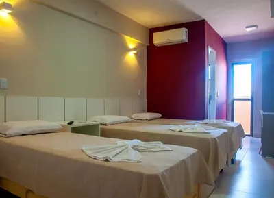 Uma cama ou camas num quarto em Murano Center Hotel