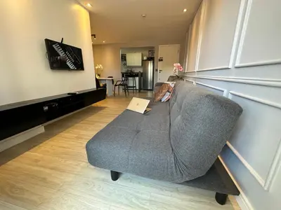 Uma televisão e/ou sistema de entretenimento em Chartres Charming Residence