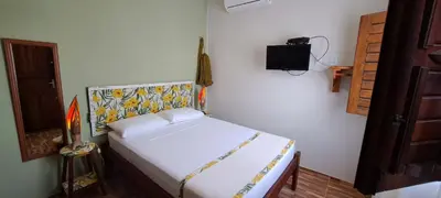 Uma cama ou camas num quarto em Casa Strela Jericoacoara