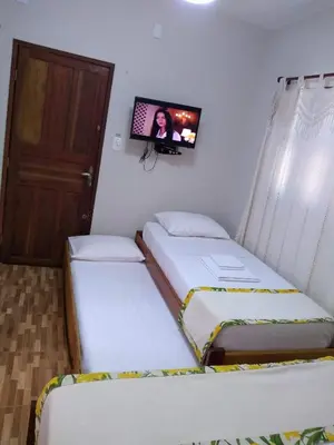 Uma cama ou camas num quarto em Casa Strela Jericoacoara