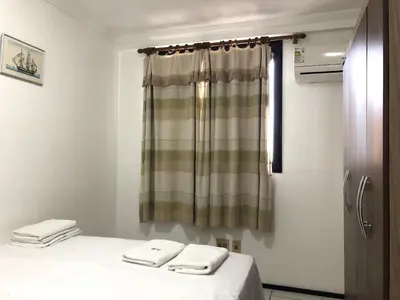 Uma cama ou camas num quarto em Porto de Iracema - Iracema Imoveis