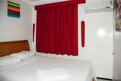 Uma cama ou camas num quarto em Porto de Iracema - Iracema Imoveis