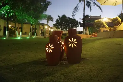 Um jardim no exterior de Pousada Casa Dona Rosa