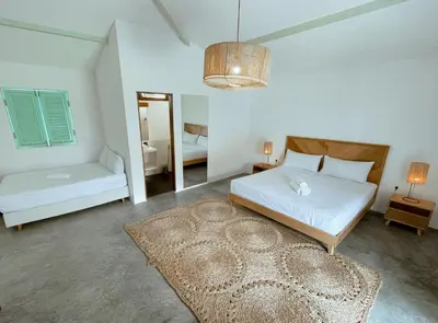 Uma cama ou camas num quarto em Vila Aytana