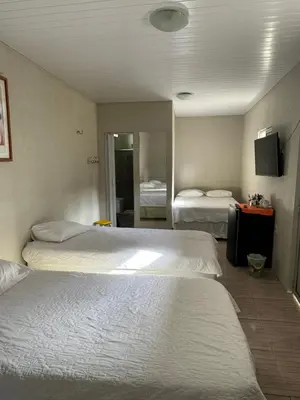 Uma cama ou camas num quarto em Pousada da Celma