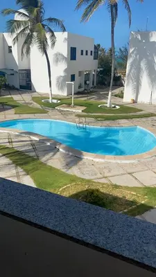 A piscina em ou perto de Porto Canoa Apartamento