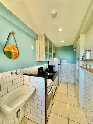 A cozinha ou kitchenette de AllMar Flats - Apartamentos frente mar - Beach Village