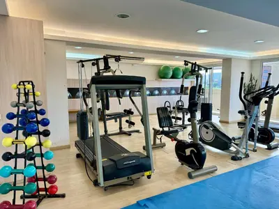 O centro de fitness e/ou as comodidades de fitness de AllMar Flats - Apartamentos frente mar - Beach Village