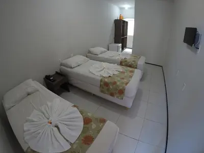 Uma cama ou camas num quarto em Iracema Mar Hotel