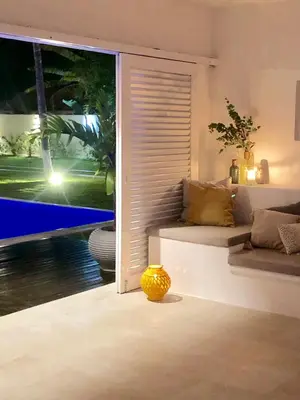 Uma cama ou camas num quarto em Casa Vivi Cumbuco
