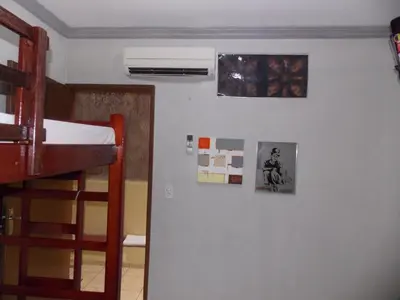 Uma cama ou camas num quarto em Léa Pousada