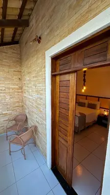 Uma cama ou camas num quarto em Pousada SandBeach