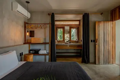 Uma cama ou camas num quarto em Villa Mango Jeri