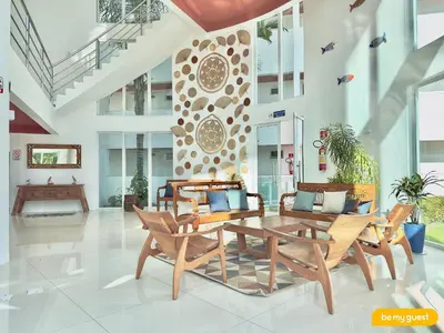 Uma área de estar em Solarium Residence no Porto das Dunas