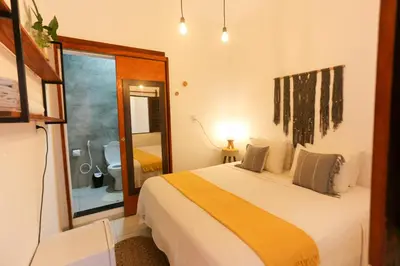 Uma cama ou camas num quarto em Pousada Movimento