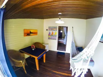 Uma área de estar em Pousada Azul Marinho