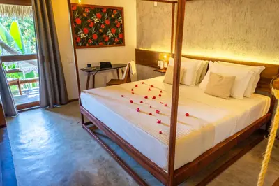 Uma cama ou camas num quarto em Casa Valentini Pousada