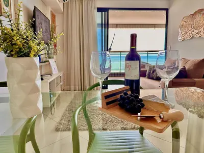 Uma área de estar em Landscape Beira Mar torre Platinum - vista incrível mar