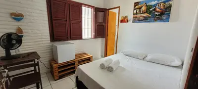 Uma cama ou camas num quarto em Beach House Paracuru - Casa da Gabi