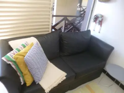 Uma área de estar em Eco Paradise ART Apt.203