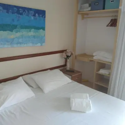 Uma cama ou camas num quarto em Eco Paradise ART Apt.203
