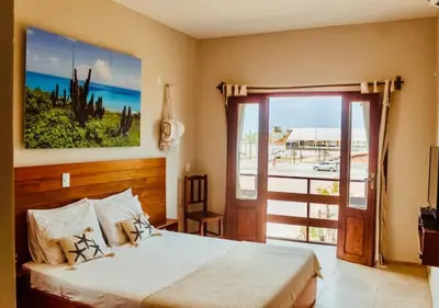 Uma cama ou camas num quarto em Casa Naná - Suites