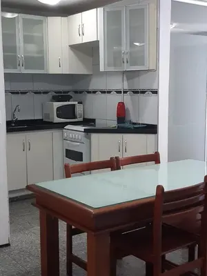 A cozinha ou kitchenette de Hotel Flat Atlântico, Apartamento Com 02 Quartos